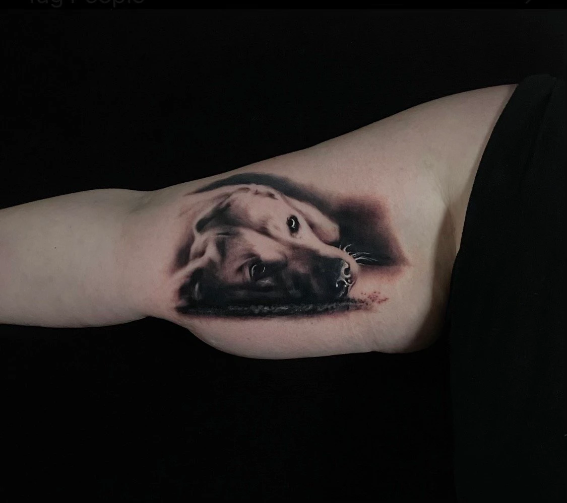 Black and grey dog portrait tattoo by Mike Storey