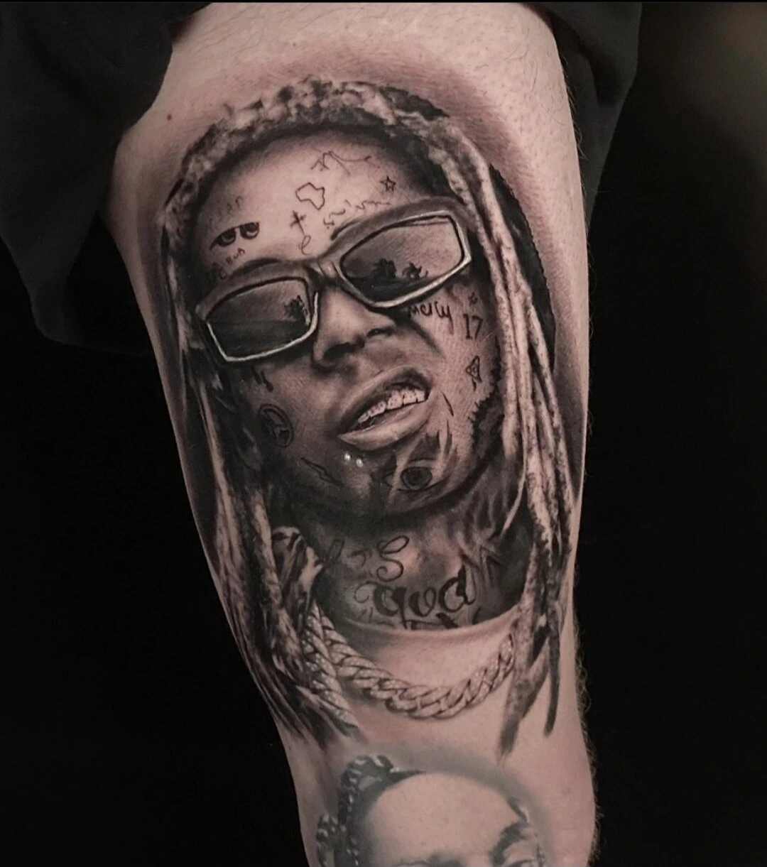 Black and grey realism portrait tattoo with sunglasses by Mike Storey