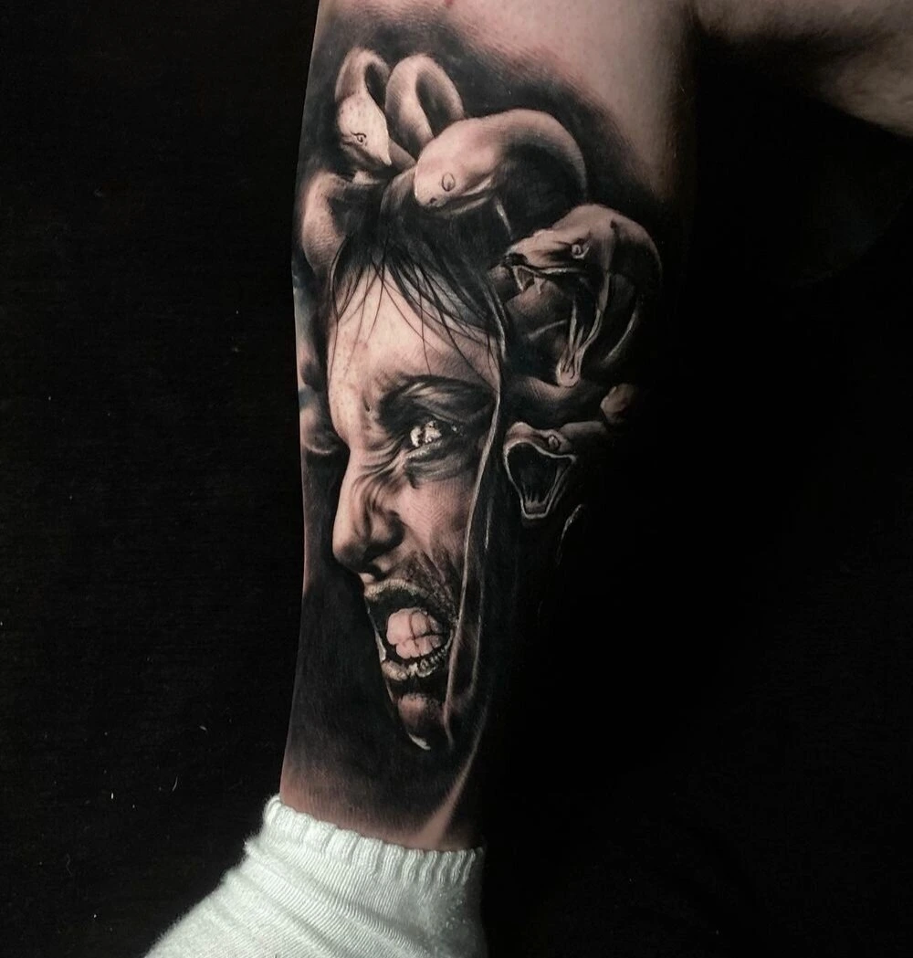 Black and grey tattoo by Mike Storey